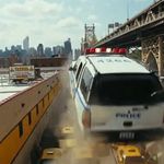 A sequence where a car is launched off a ramp in Queens